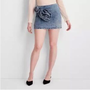 Stylish Blue Denim Mini Skirt with Floral Accent